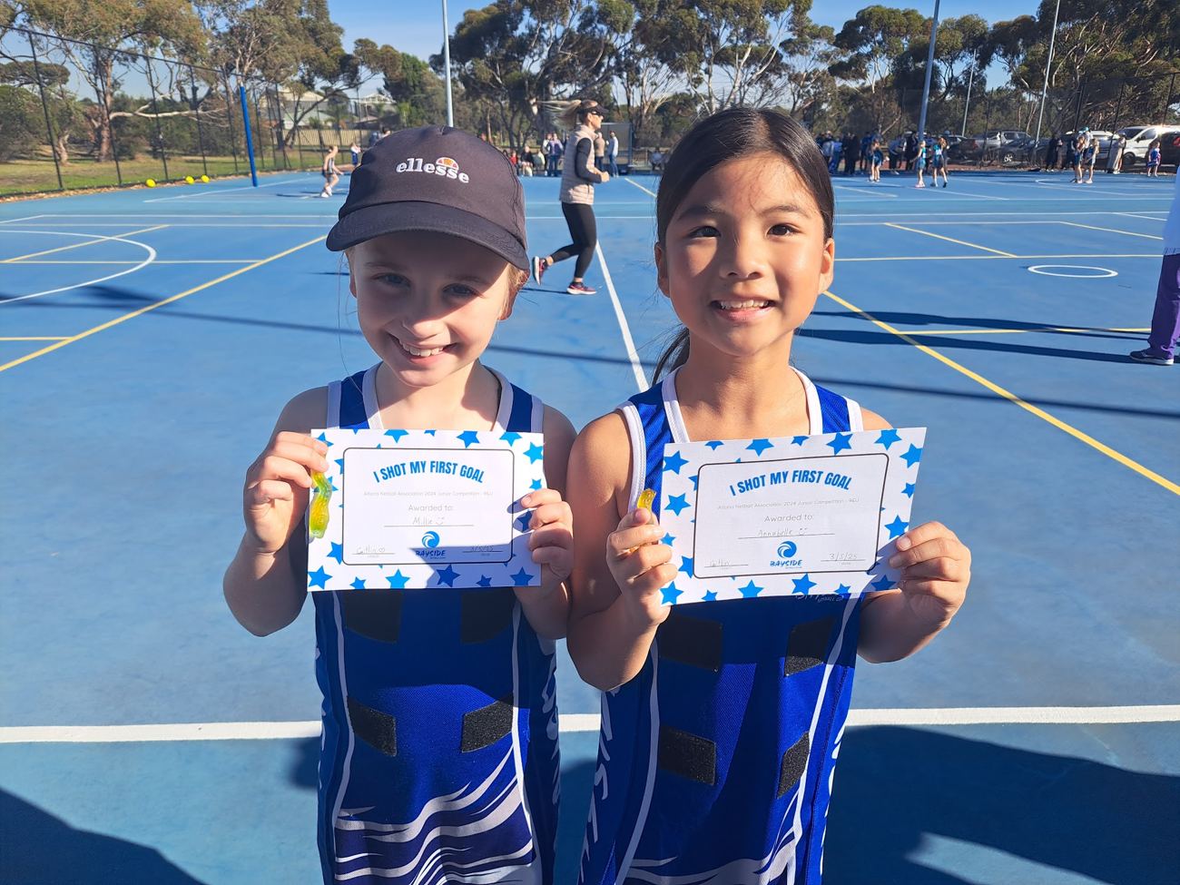Two young players with their first goal certificates